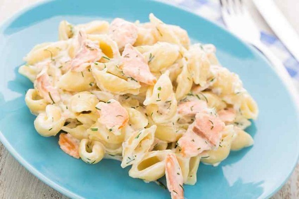 delicious pasta with salmon on a plate